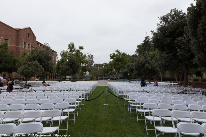 Photo of empty chairs arrayed in Powell Courtyard