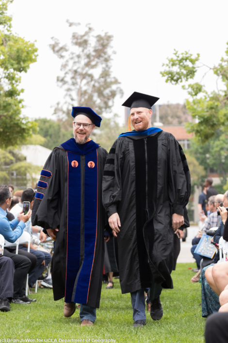 Photo of professors marching down the aisle