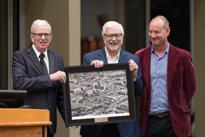 Professor Agnew receiving personal air photo